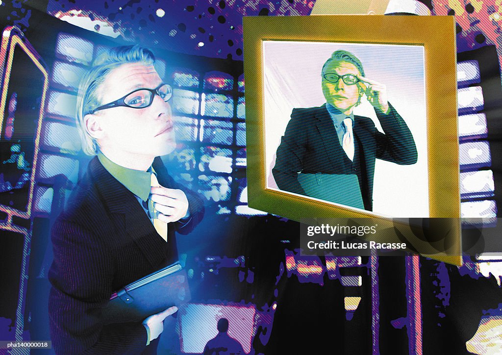 Young businessman standing in front of computer monitor, same man on screen, digital composite.
