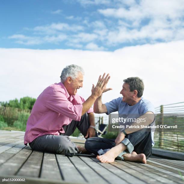 Slapping 213 Happy Slapping Stock Photos, High-Res Pictures, and Images - Getty ...