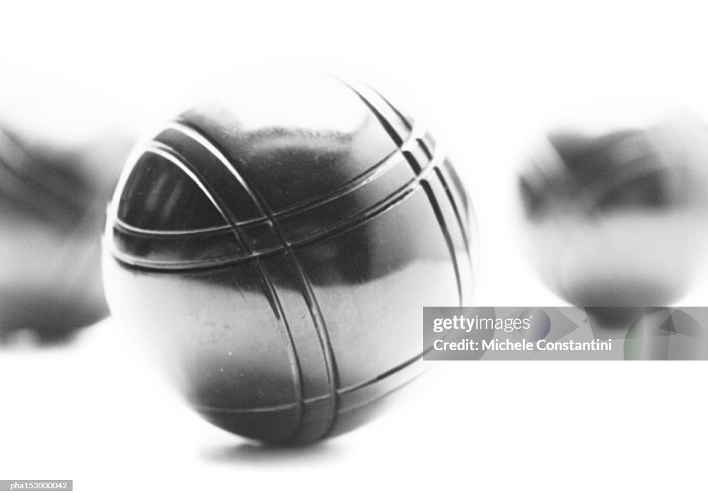 Metal bocce balls, b&w.