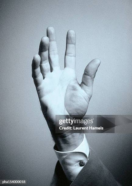 open hand, b&w. - long sleeve stock pictures, royalty-free photos & images