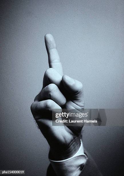 hand, finger pointing up, b&w. - w hand sign stock pictures, royalty-free photos & images