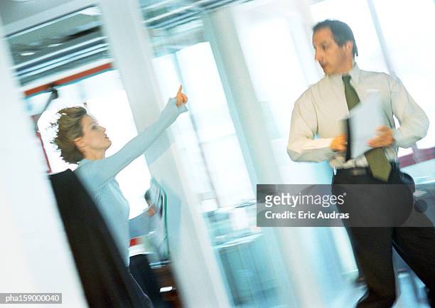 woman in hurry, hand up, co-worker looking. - rejection bildbanksfoton och bilder