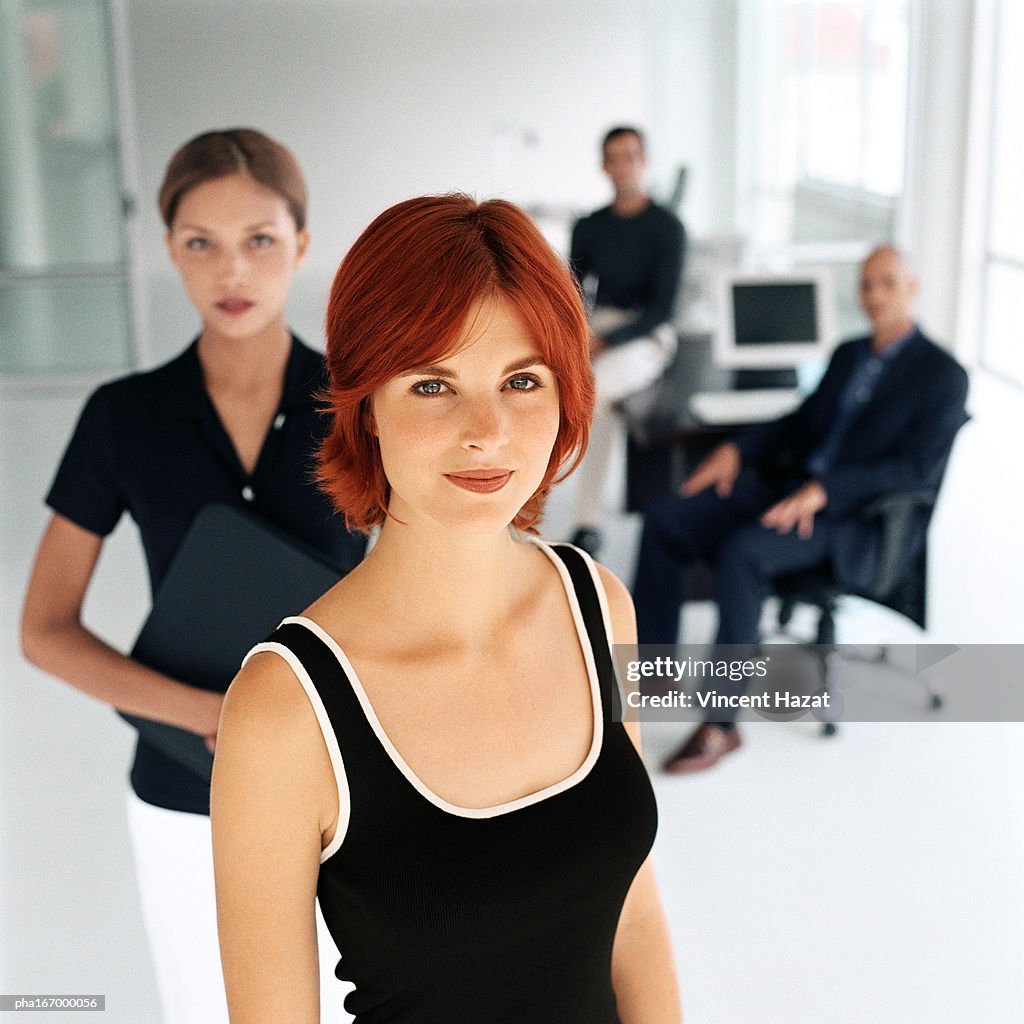 Business people in office, portrait