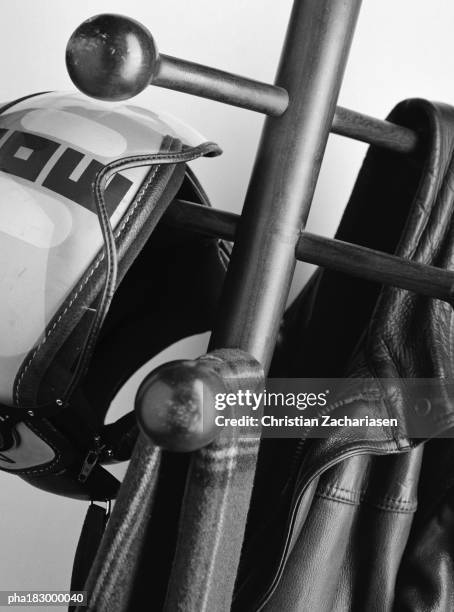 scarf and jacket on hat stand, close-up, b&w - blouson en cuir photos et images de collection