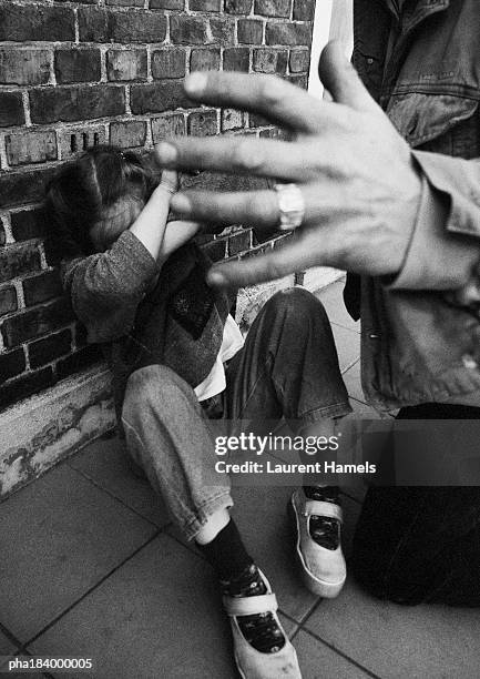 teenager protecting self from assailant, close-up, b&w - assailant stock pictures, royalty-free photos & images