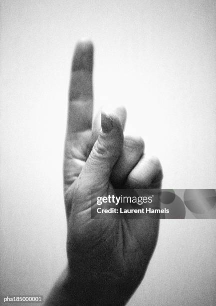 hand, close-up, b&w - w hand sign stock pictures, royalty-free photos & images