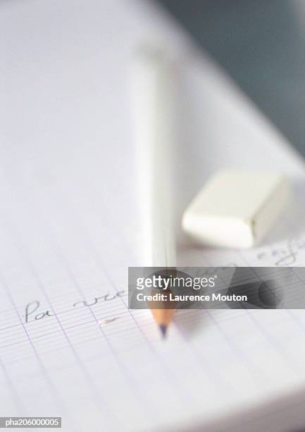 pad, pencil and eraser. - intersected stock pictures, royalty-free photos & images