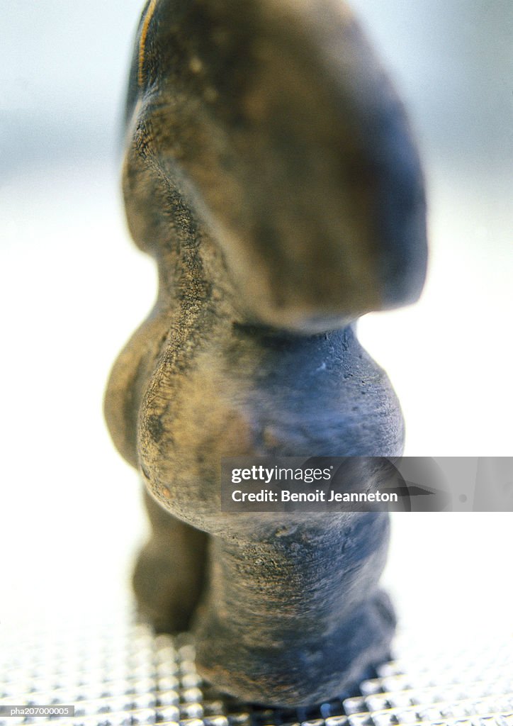 Stone figure.