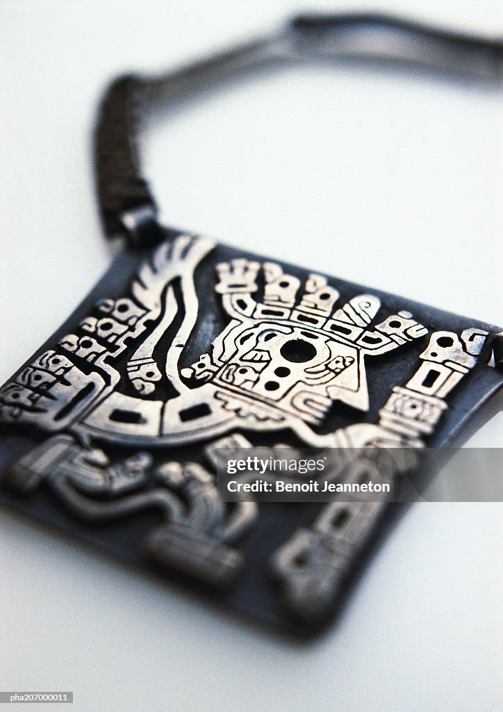 Carved necklace.
