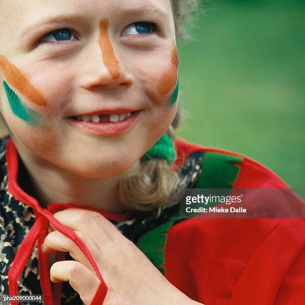 little girl wearing war paint, close-up. - war stock-fotos und bilder