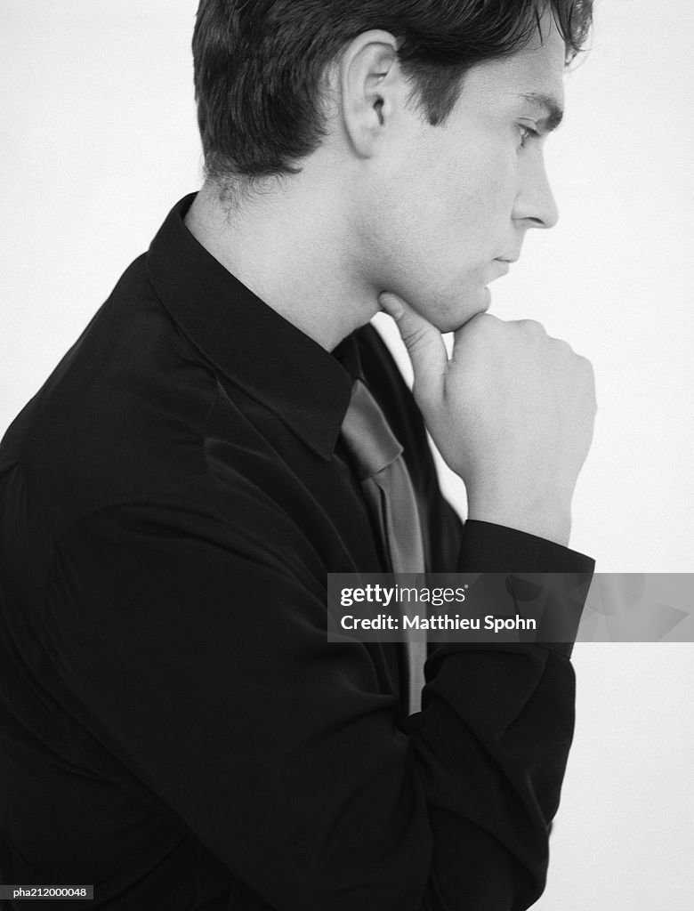 Man thinking, portrait, b&w.