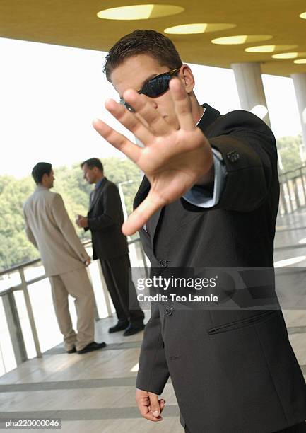 businessman, holding hand out. - overheidsberoep stockfoto's en -beelden