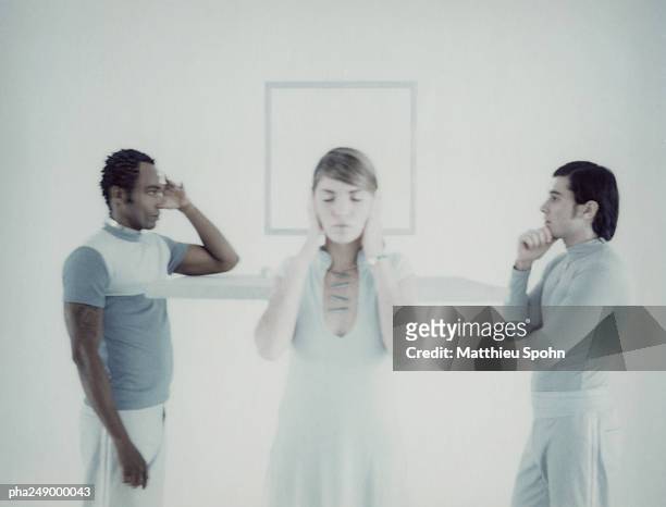 three people in front of square frame - mind reading stock pictures, royalty-free photos & images