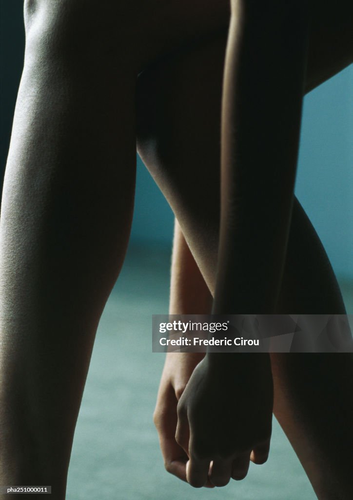 Nude arms and legs, close-up