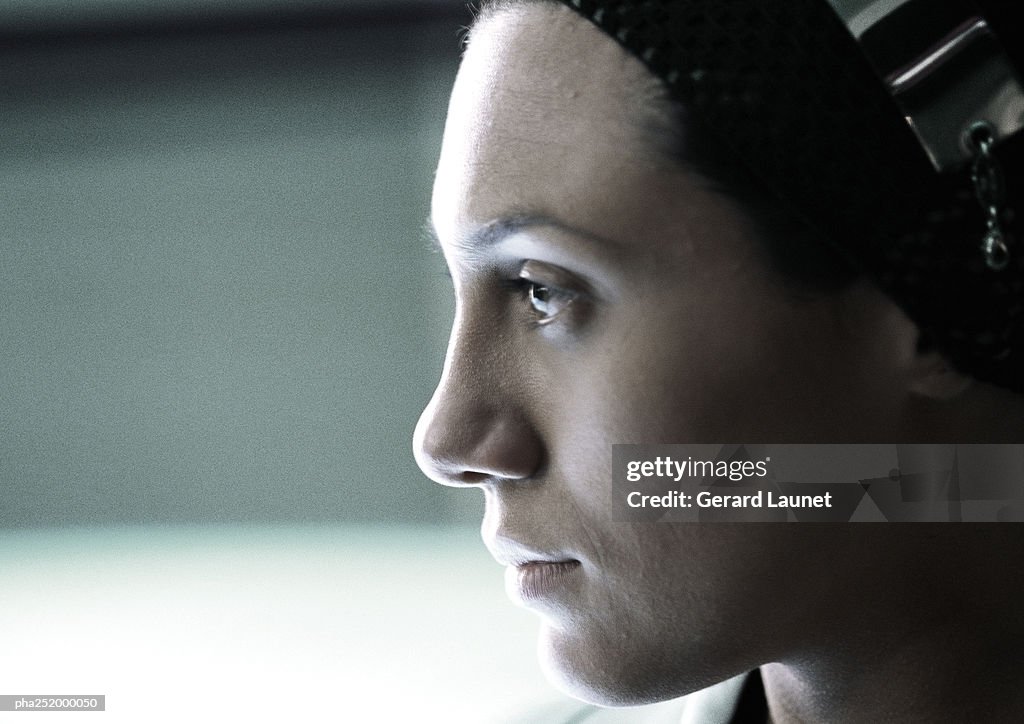 Woman's face, side view, close-up