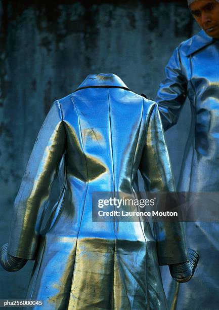 empty silvery suit, rear view - modell stock pictures, royalty-free photos & images