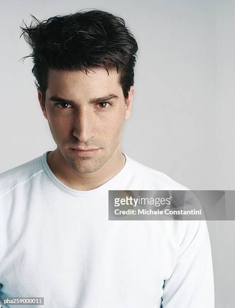 young man looking at camera, head and shoulders - 2005 20 stock pictures, royalty-free photos & images