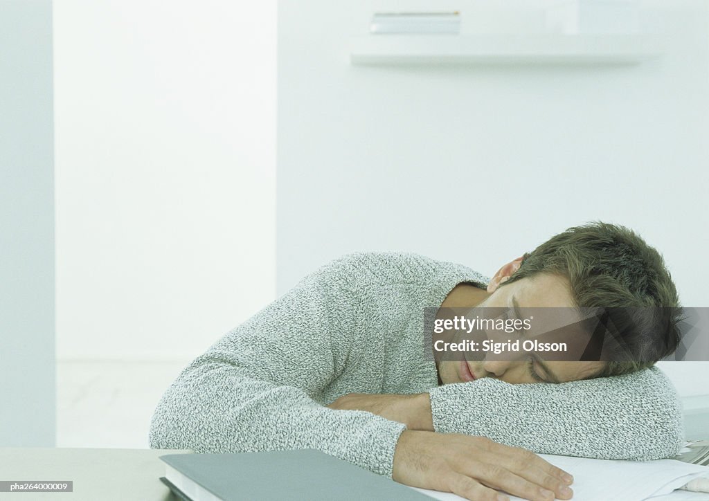Man sleeping at table