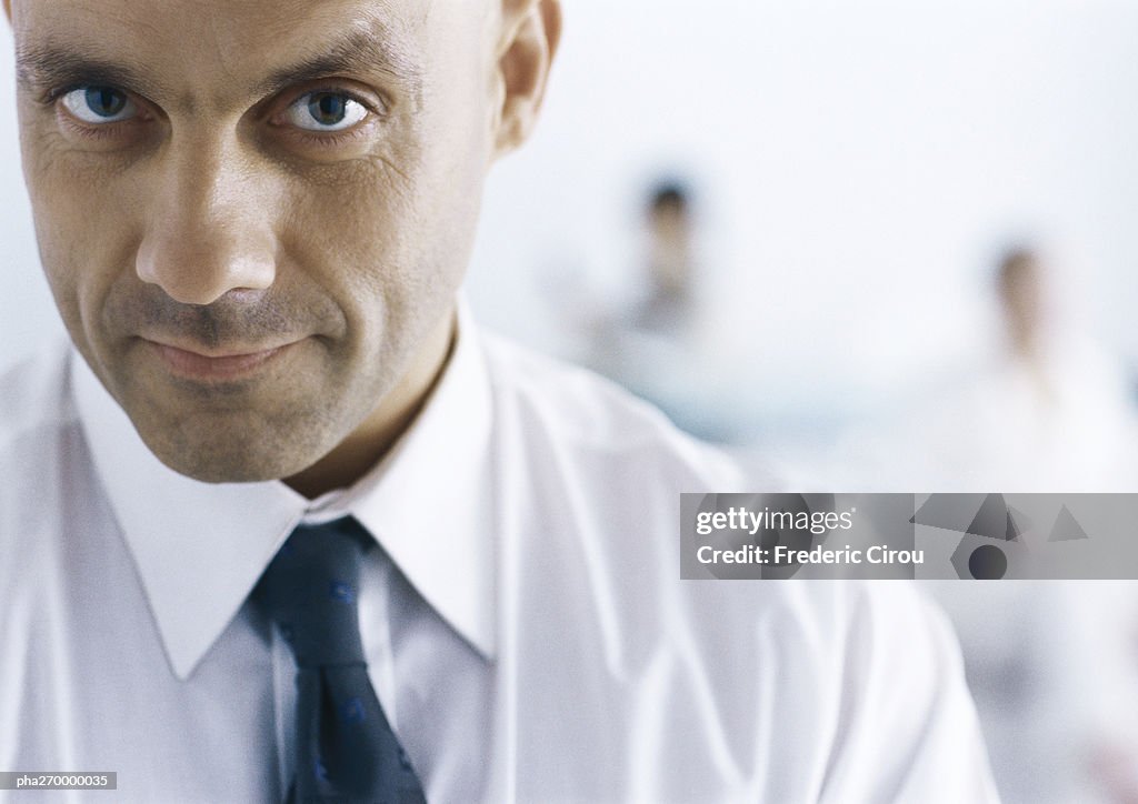 Businessman looking at camera