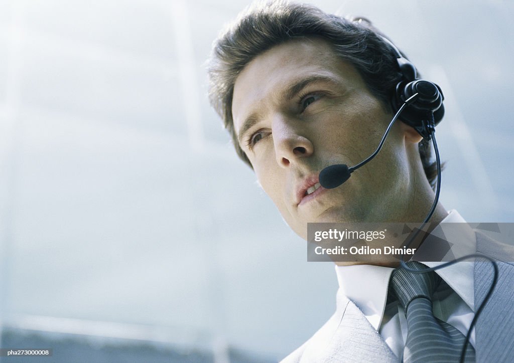 Man with headset, low angle shot