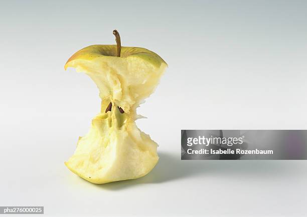 apple core - apple bite out stock pictures, royalty-free photos & images