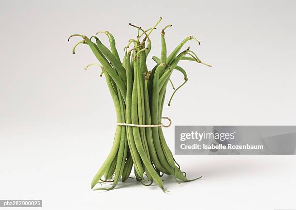 bundle of string beans - green bean stock pictures, royalty-free photos & images