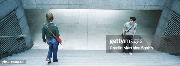 young people in subway entrance - 通過する ストックフォトと画像