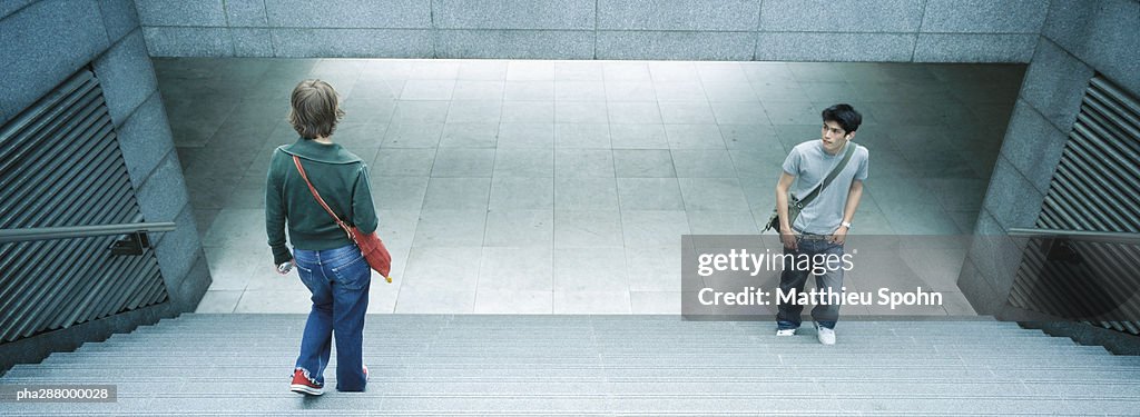 Young people in subway entrance