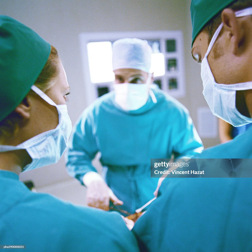 Doctors performing operation