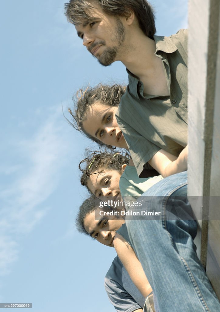 Group of young people, low angle view