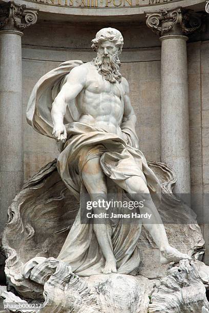 italy, rome, trevi fountain, statue of neptune - sculpture foto e immagini stock