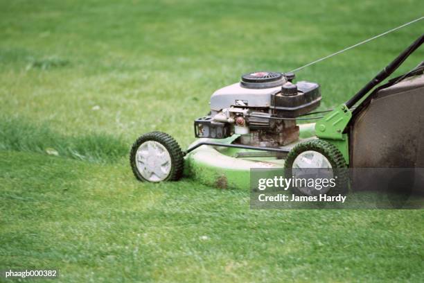 mowing grass - gräsklippare bildbanksfoton och bilder