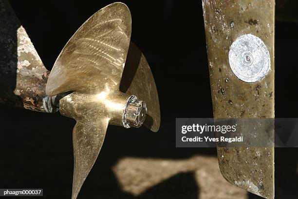 boat propeller and rudder, close-up - yves stock pictures, royalty-free photos & images