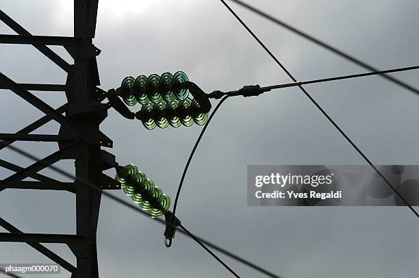 electrical cables and pylon, close-up - yves stock pictures, royalty-free photos & images