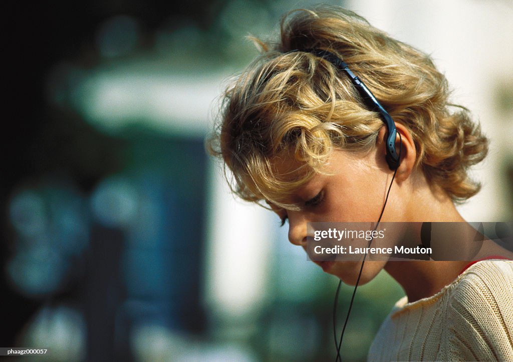 Girl listening to headphones