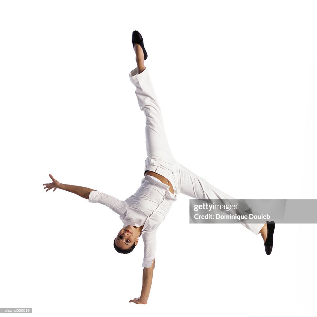 Woman turning cartwheel