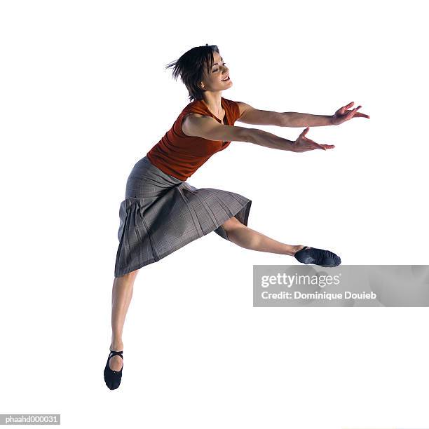 woman jumping - skirt isolated stock pictures, royalty-free photos & images