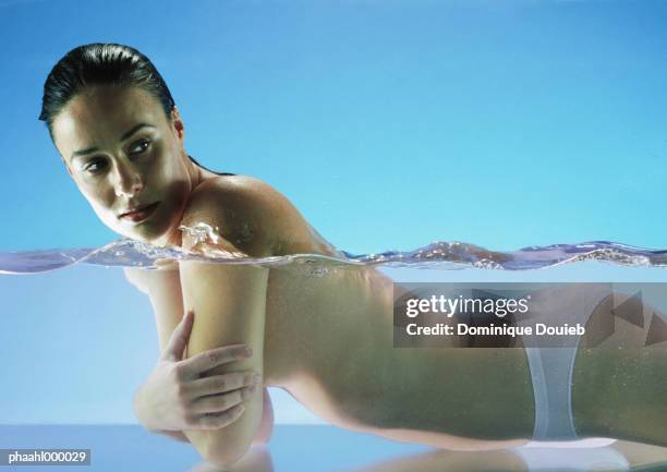semi-nude woman in water - balneotherapy stock pictures, royalty-free photos & images