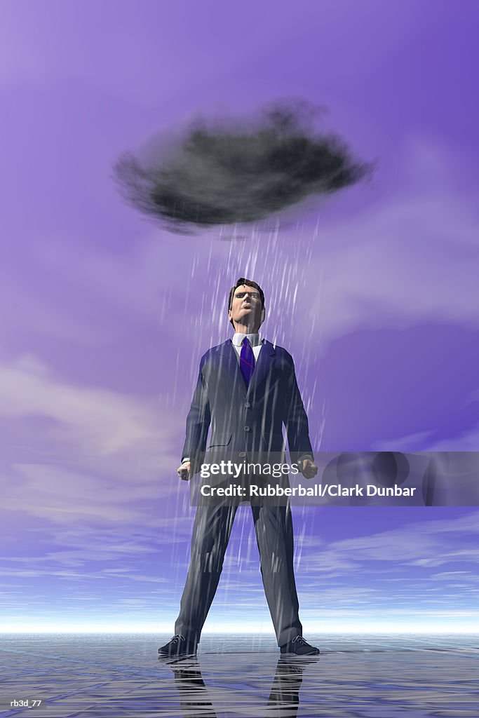 Dark rain cloud hangs over a business man