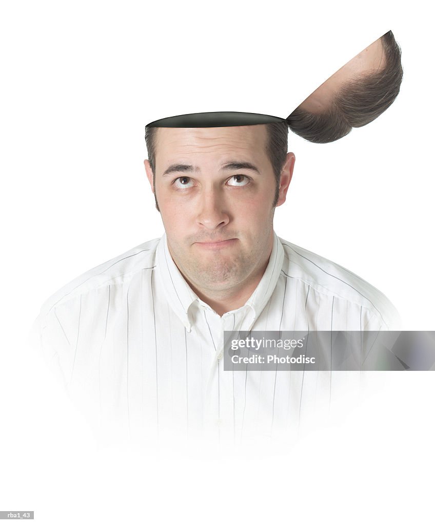 Conceptual photo of a caucasian man with a flip top head as he glances up at his head