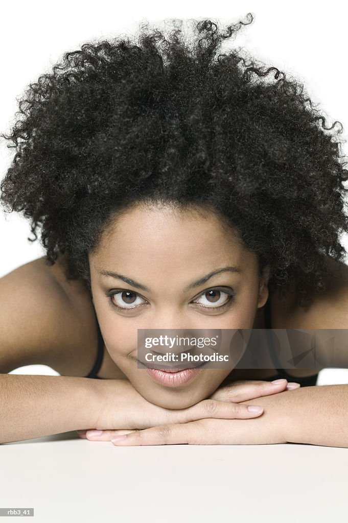 Close up portrait of a young african american woman as she smiles