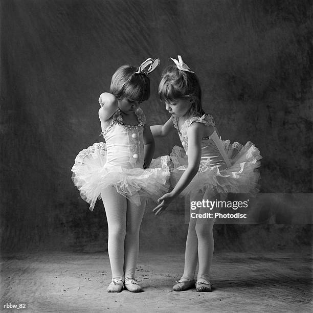 two young caucasian ballerinas primp and get ready to dance - get stock pictures, royalty-free photos & images