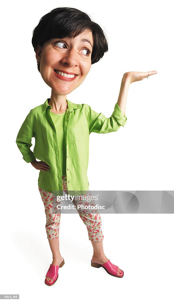 Photo caricature of a caucasian woman in a green shirt and floral pants stands smiling with her arm outstretched and hand raised