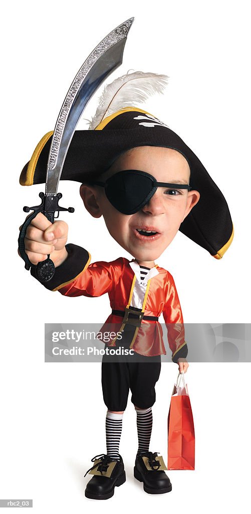 Photo caricature of a caucasian boy in his pirate costume, as he waves his sword in the air with one hand, and a trick or treat bag in the other