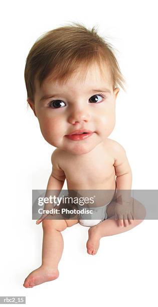 photo caricature of a little baby in her diaper looking upward - one baby girl only bildbanksfoton och bilder