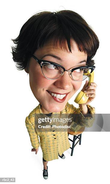 photo caricature of a girl smiling as she talks on the phone - cats eye glasses stock pictures, royalty-free photos & images