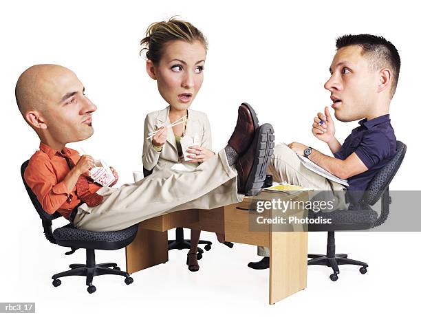 two caucasian men and a caucasian woman have a work meeting while they eat chinese food and discuss business - chinese takeout white background stock pictures, royalty-free photos & images