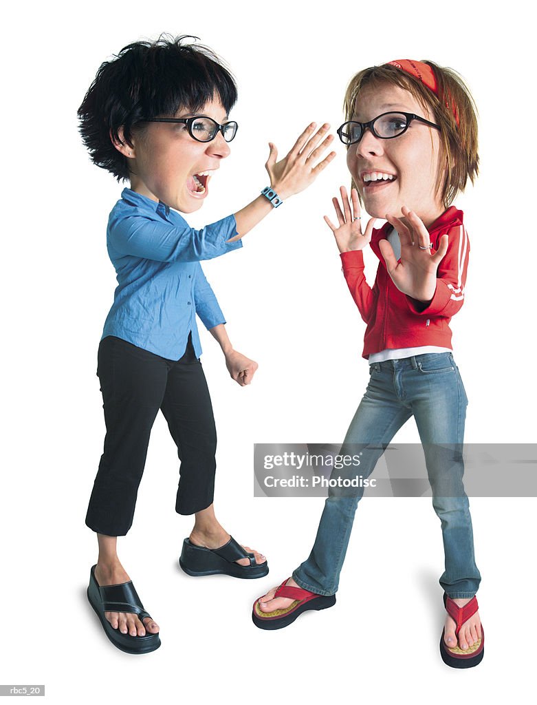 A caucasian female wearing black horn rimmed glasses defends herself against another caucasian female wearing black horn rimmed glasses who is about to slap her