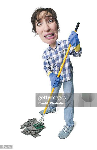 photo caricature of a caucasian woman holding a mop and appearing very stressed out - huge task stock pictures, royalty-free photos & images