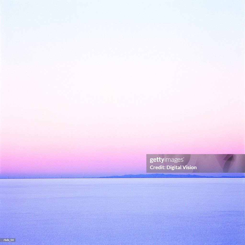 White pink and blue sunset on the salt flats of utah